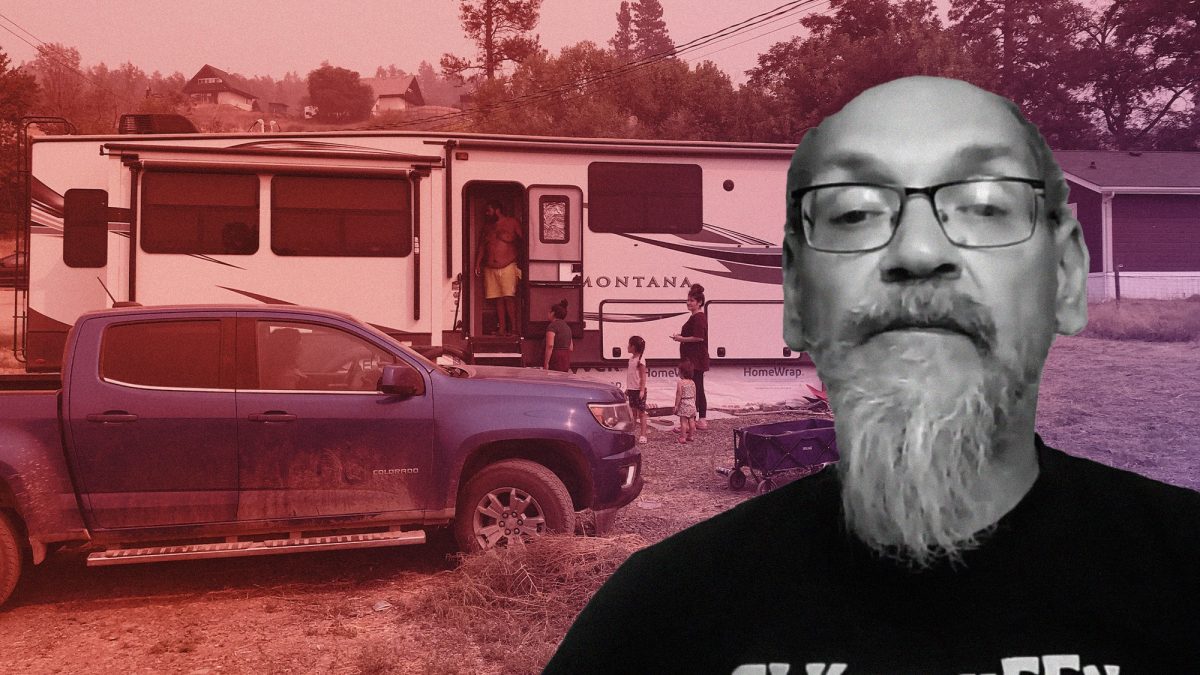 Patrick Michell, former chief of Kanaka Bar Indian Band, is seen in front of a trailer his family bought after their house was burned down by wildfire.