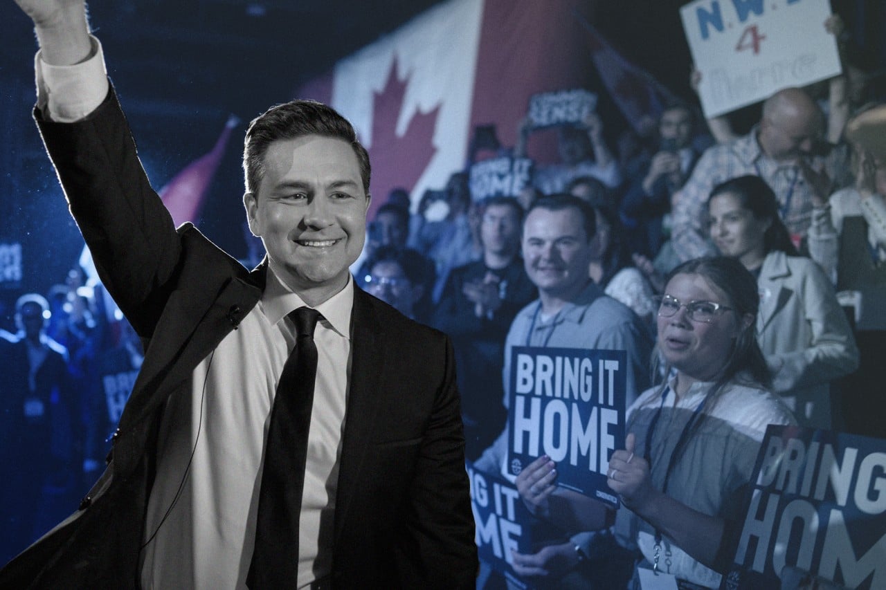 Pierre Poilievre is seen waving to the crowd at the Conservative party's 2023 convention in Quebec City.
