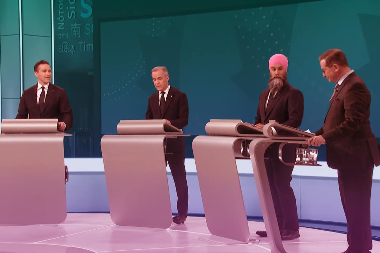 Pierre Poilievre, Mark Carney, Jagmeet Singh, and Yves-François Blanchet stand behind their podiums.