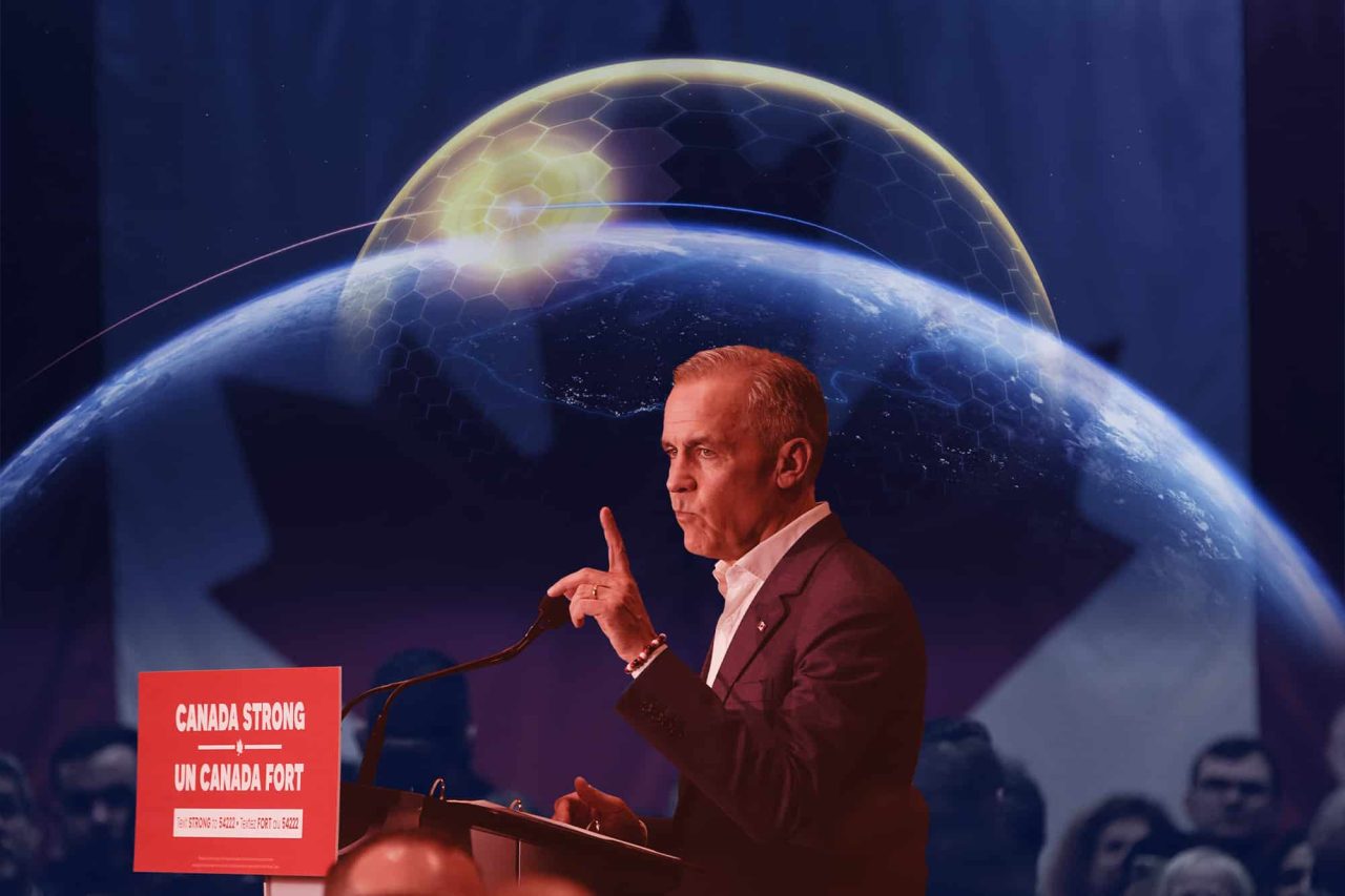 Mark Carney stands in front of a projected map of the 'Golden Dome'